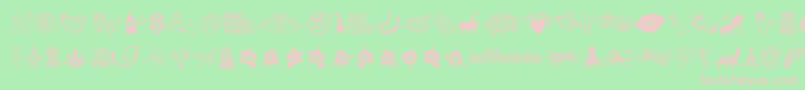 WcSchlaasssClassic-fontti – vaaleanpunaiset fontit vihreällä taustalla