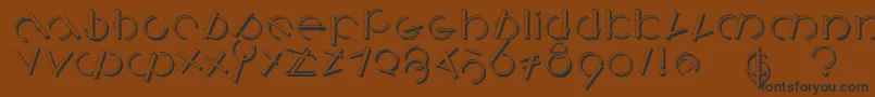 フォントLogomatiqueshadow – 黒い文字が茶色の背景にあります