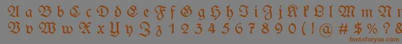 WieynckfrakturGesperrtunz1l Font – Brown Fonts on Gray Background