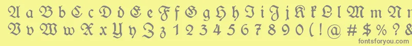 WieynckfrakturGesperrtunz1l-Schriftart – Graue Schriften auf gelbem Hintergrund