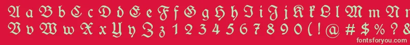 フォントWieynckfrakturGesperrtunz1l – 赤い背景に緑の文字