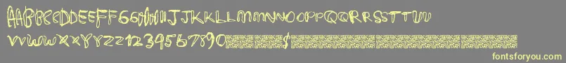 Deliciouscandy Font – Yellow Fonts on Gray Background