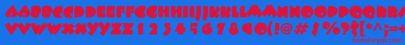Beeskneesstd Font – Red Fonts on Blue Background