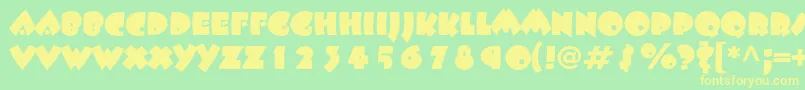 Beeskneesstd Font – Yellow Fonts on Green Background