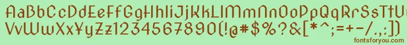 フォントNovacut – 緑の背景に茶色のフォント