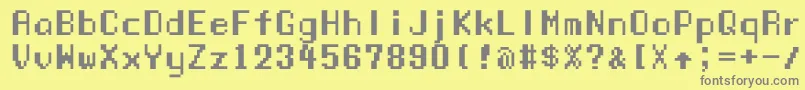 Manaspc Font – Gray Fonts on Yellow Background