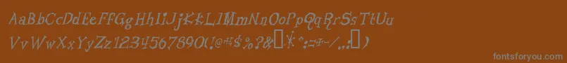 フォントLivingByNumbers – 茶色の背景に灰色の文字