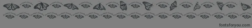 Wlroyalflutterdingbats-Schriftart – Schwarze Schriften auf grauem Hintergrund