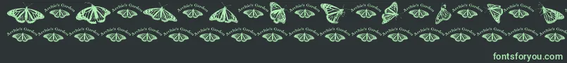 Wlroyalflutterdingbats-Schriftart – Grüne Schriften auf schwarzem Hintergrund