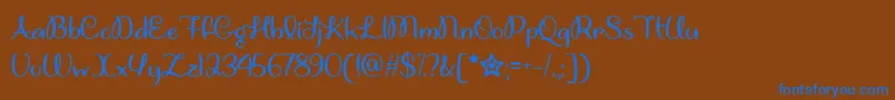 UnicornGigglesTtf Font – Blue Fonts on Brown Background