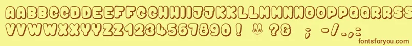 フォントBunny$Mambo – 茶色の文字が黄色の背景にあります。