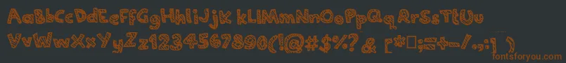 Joannecandy Font – Brown Fonts on Black Background