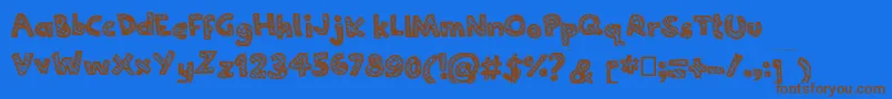 Joannecandy Font – Brown Fonts on Blue Background