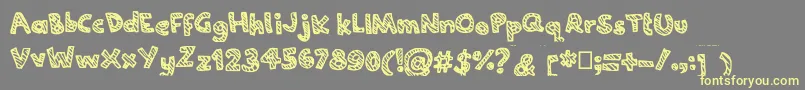 Joannecandy Font – Yellow Fonts on Gray Background