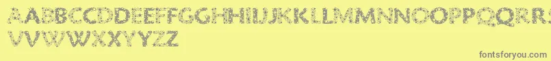 フォントRazzle – 黄色の背景に灰色の文字
