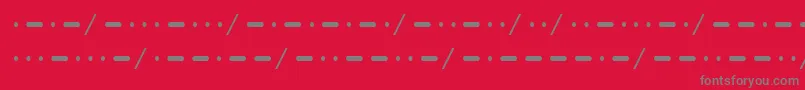 フォントMorse – 赤い背景に灰色の文字