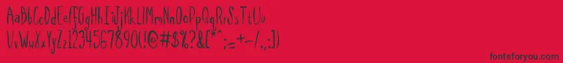 フォントSpilmrg – 赤い背景に黒い文字