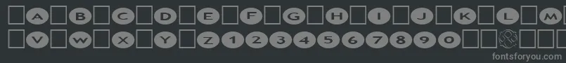 フォントAlphashapesOvals2 – 黒い背景に灰色の文字