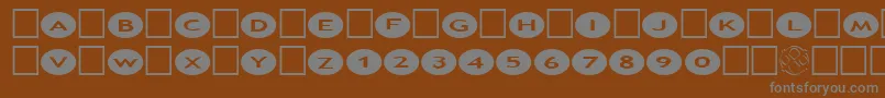Шрифт AlphashapesOvals2 – серые шрифты на коричневом фоне