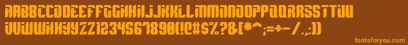 フォントSpyh – オレンジ色の文字が茶色の背景にあります。