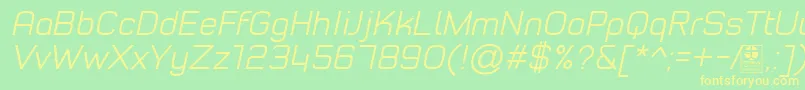 TypoStyleLightItalicDemo-fontti – keltaiset fontit vihreällä taustalla