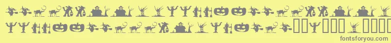 SilbooettesTryout-fontti – harmaat kirjasimet keltaisella taustalla