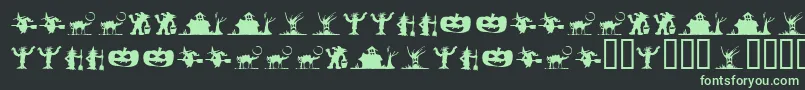 SilbooettesTryout Font – Green Fonts on Black Background