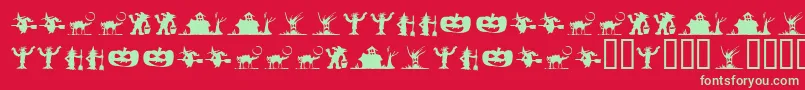 フォントSilbooettesTryout – 赤い背景に緑の文字