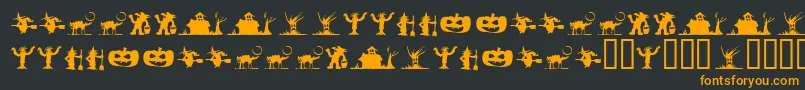 フォントSilbooettesTryout – 黒い背景にオレンジの文字