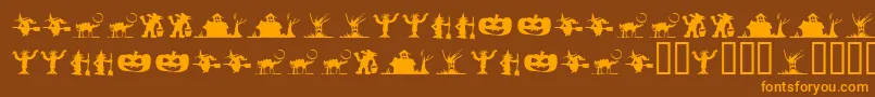 フォントSilbooettesTryout – オレンジ色の文字が茶色の背景にあります。