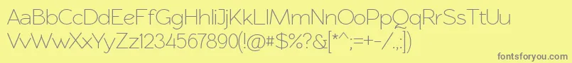 Rawengulksans094-fontti – harmaat kirjasimet keltaisella taustalla