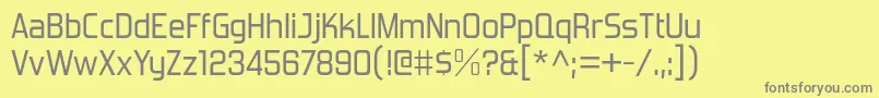 ForgottenFuturistRg-fontti – harmaat kirjasimet keltaisella taustalla