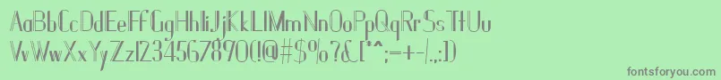 フォントJanesville51Bold – 緑の背景に灰色の文字