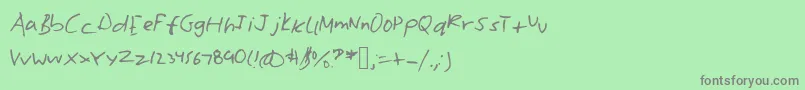 フォントWilliamshand – 緑の背景に灰色の文字
