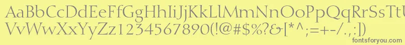 DiotimaltstdRoman-fontti – harmaat kirjasimet keltaisella taustalla