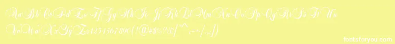 BalladScriptRegular-fontti – valkoiset fontit keltaisella taustalla