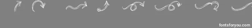 Fonte GoAroundTheBooksArrows – fontes brancas em um fundo cinza