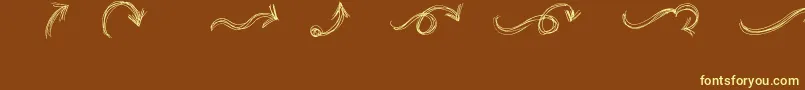 GoAroundTheBooksArrows Font – Yellow Fonts on Brown Background