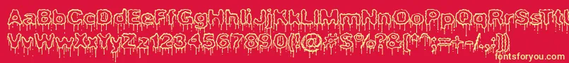 フォントPlasmaDripEmptyBrk – 黄色の文字、赤い背景