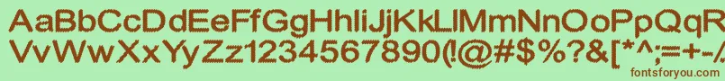 CylonicCrossdraft Font – Brown Fonts on Green Background