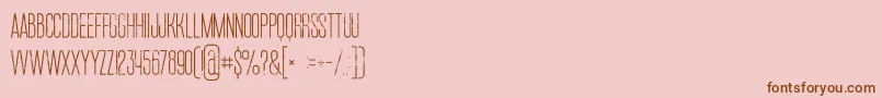 Ruasmediumgrunge-Schriftart – Braune Schriften auf rosa Hintergrund