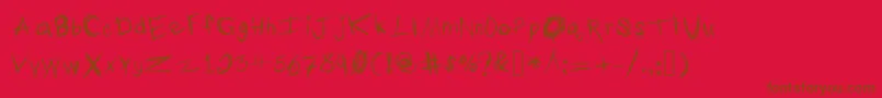 TheTypingOfAMadman Font – Brown Fonts on Red Background