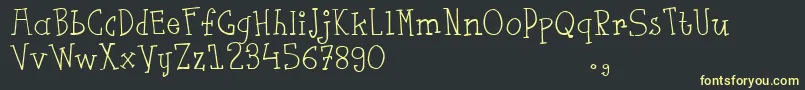 Fsaustrial Font – Yellow Fonts on Black Background