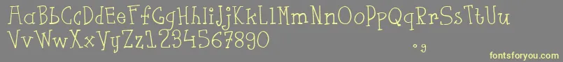 Fsaustrial Font – Yellow Fonts on Gray Background