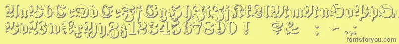 ProclamateEmbossed Font – Gray Fonts on Yellow Background