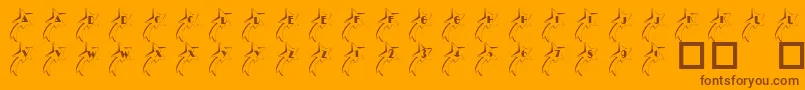 Czcionka 101ShootingStarz – brązowe czcionki na pomarańczowym tle
