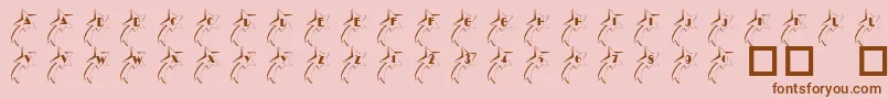 フォント101ShootingStarz – ピンクの背景に茶色のフォント
