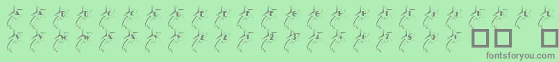 101ShootingStarz-fontti – harmaat kirjasimet vihreällä taustalla