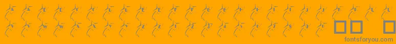 Czcionka 101ShootingStarz – szare czcionki na pomarańczowym tle