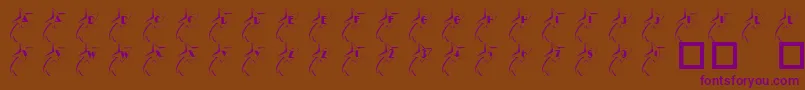Czcionka 101ShootingStarz – fioletowe czcionki na brązowym tle